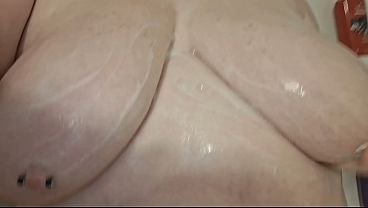 BBW washes huge tits 2 min